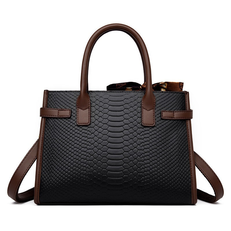 Embossed snakeskin pattern handbag