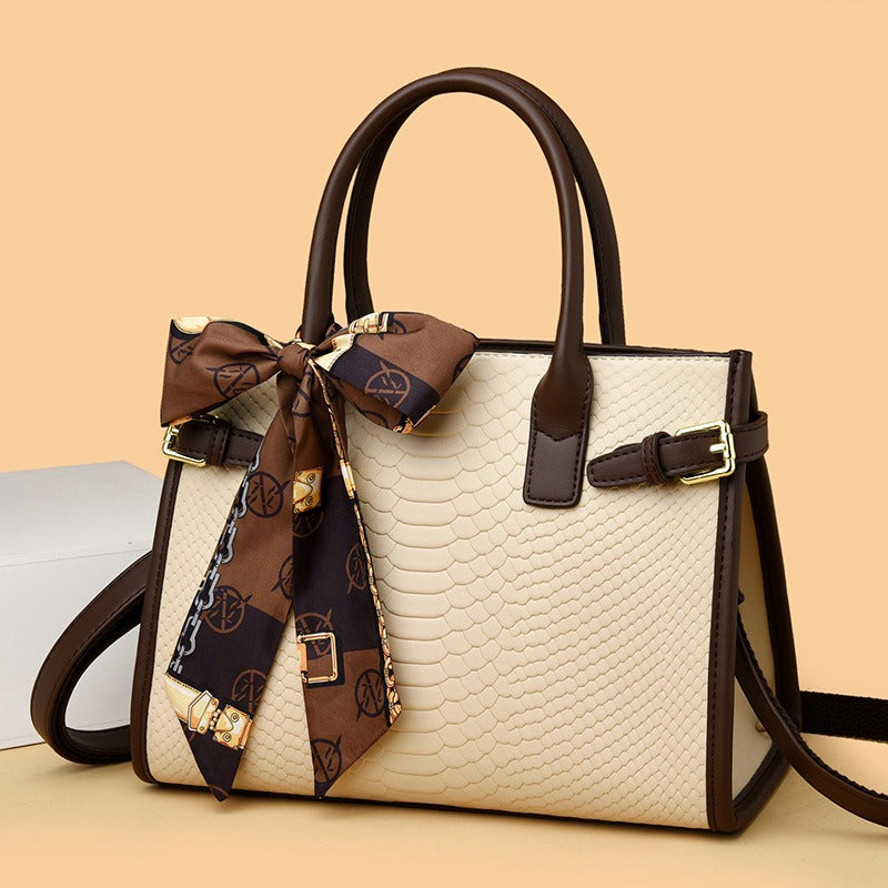 Embossed snakeskin pattern handbag