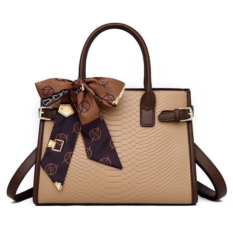 Embossed snakeskin pattern handbag