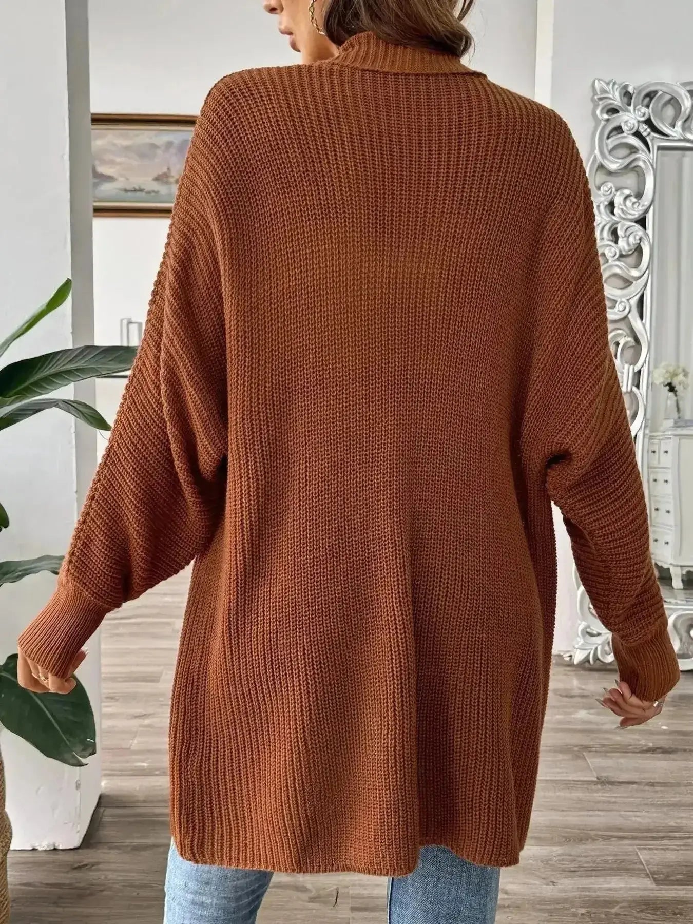 Rust brown oversized knit cardigan for women, cozy long-sleeve sweater with ribbed texture, modern minimalist style