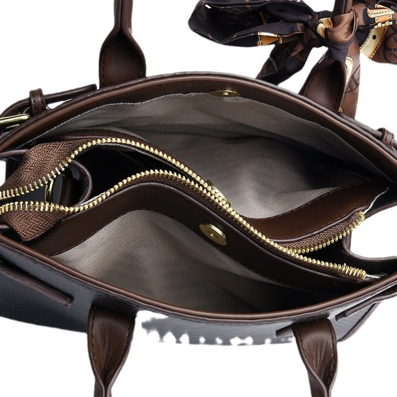 Embossed snakeskin pattern handbag