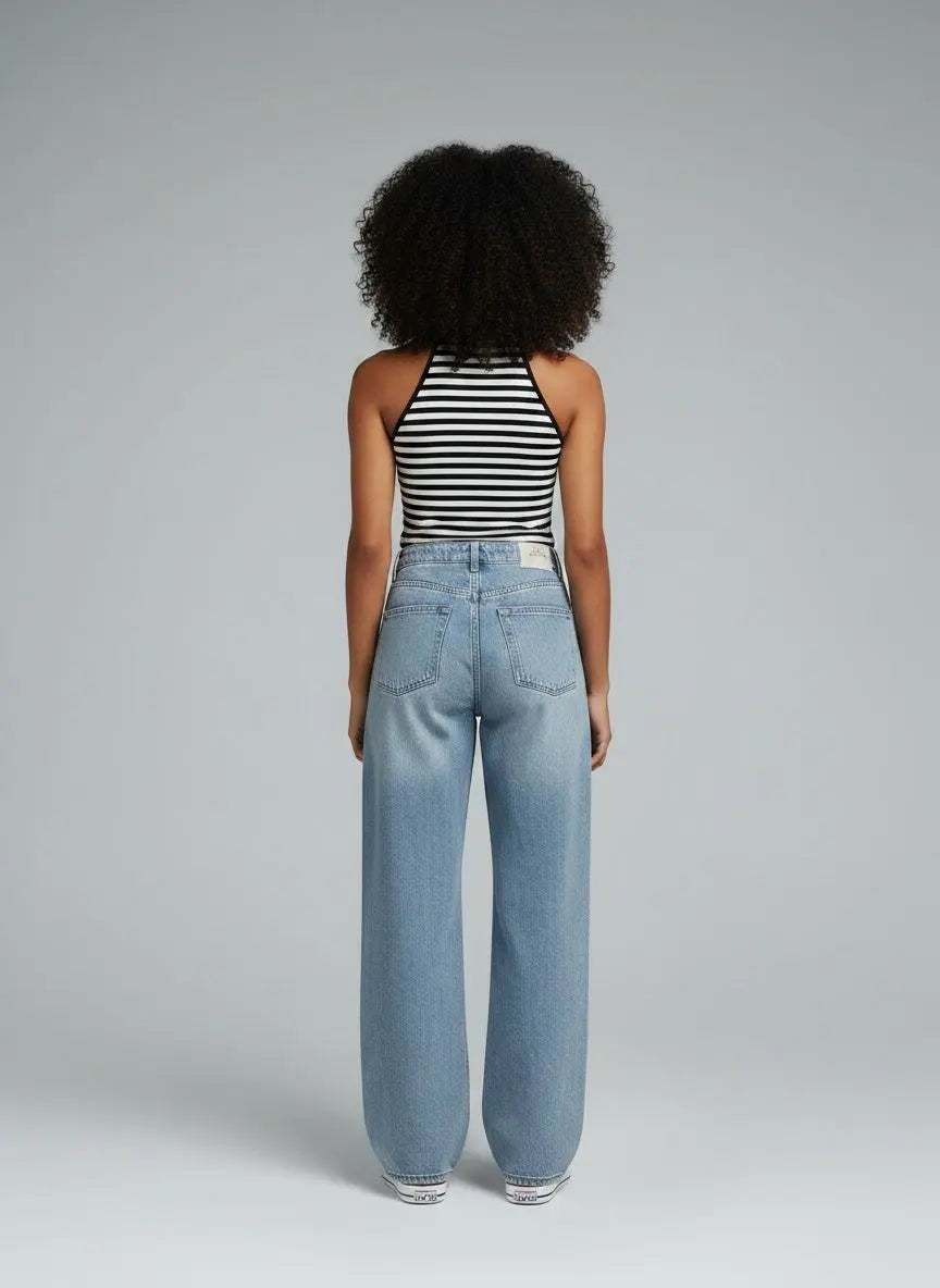 Back pose of the model wearing Striped Cutout Shoulder Cami
