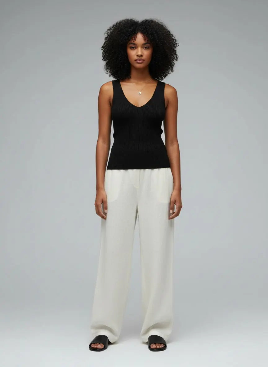 Full body view of the model wearing V-Neck Slim Fit Tank