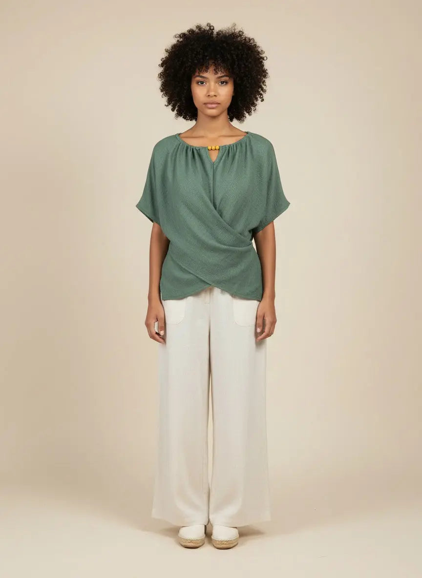 Full body view of the model wearing Beaded Neckline Short Sleeve Blouse