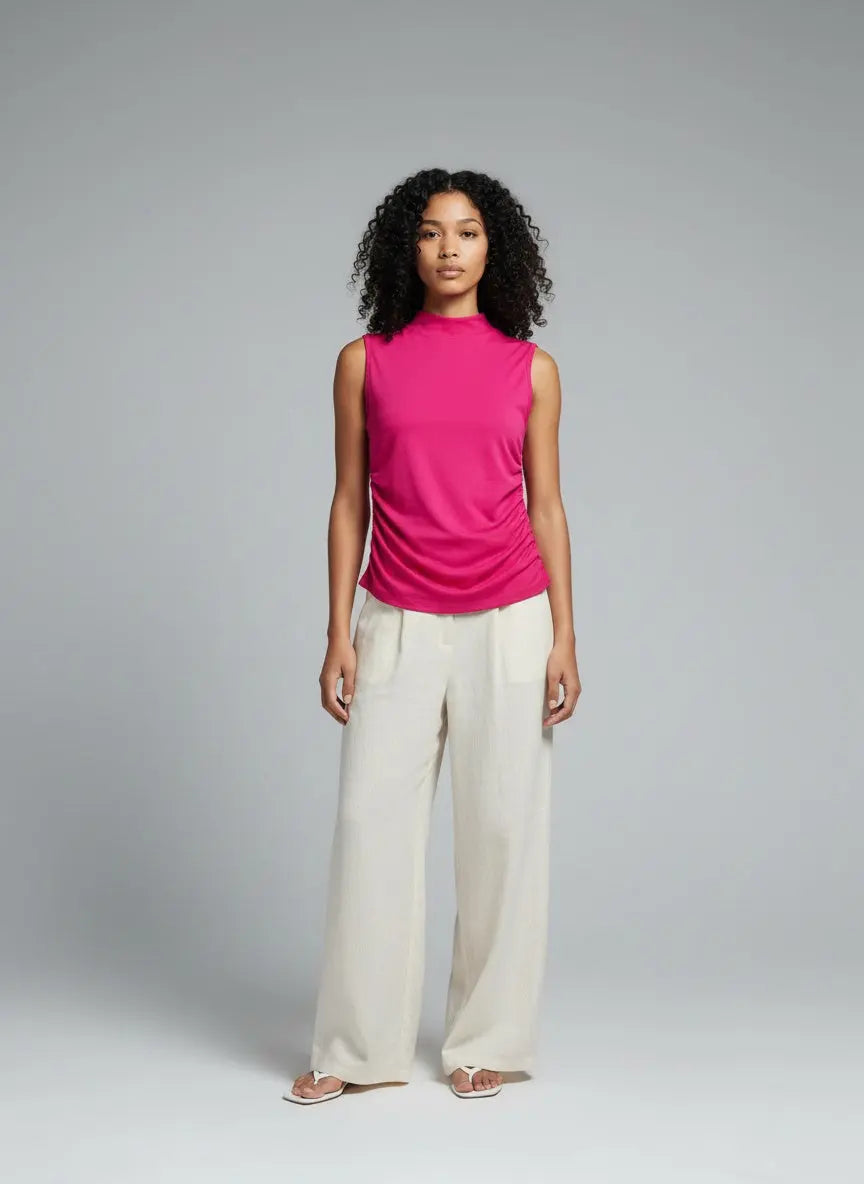 Full body view of the model wearing Ruched Mock Neck Tank