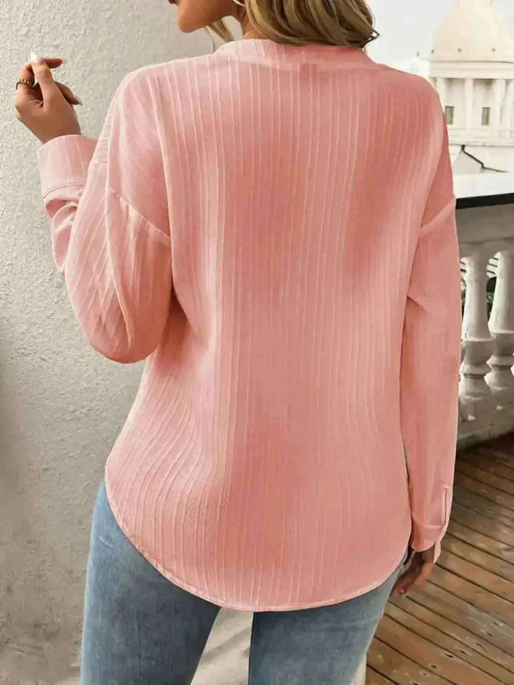 Pink long sleeve blouse with vertical pleats, modern minimalist women's fashion top