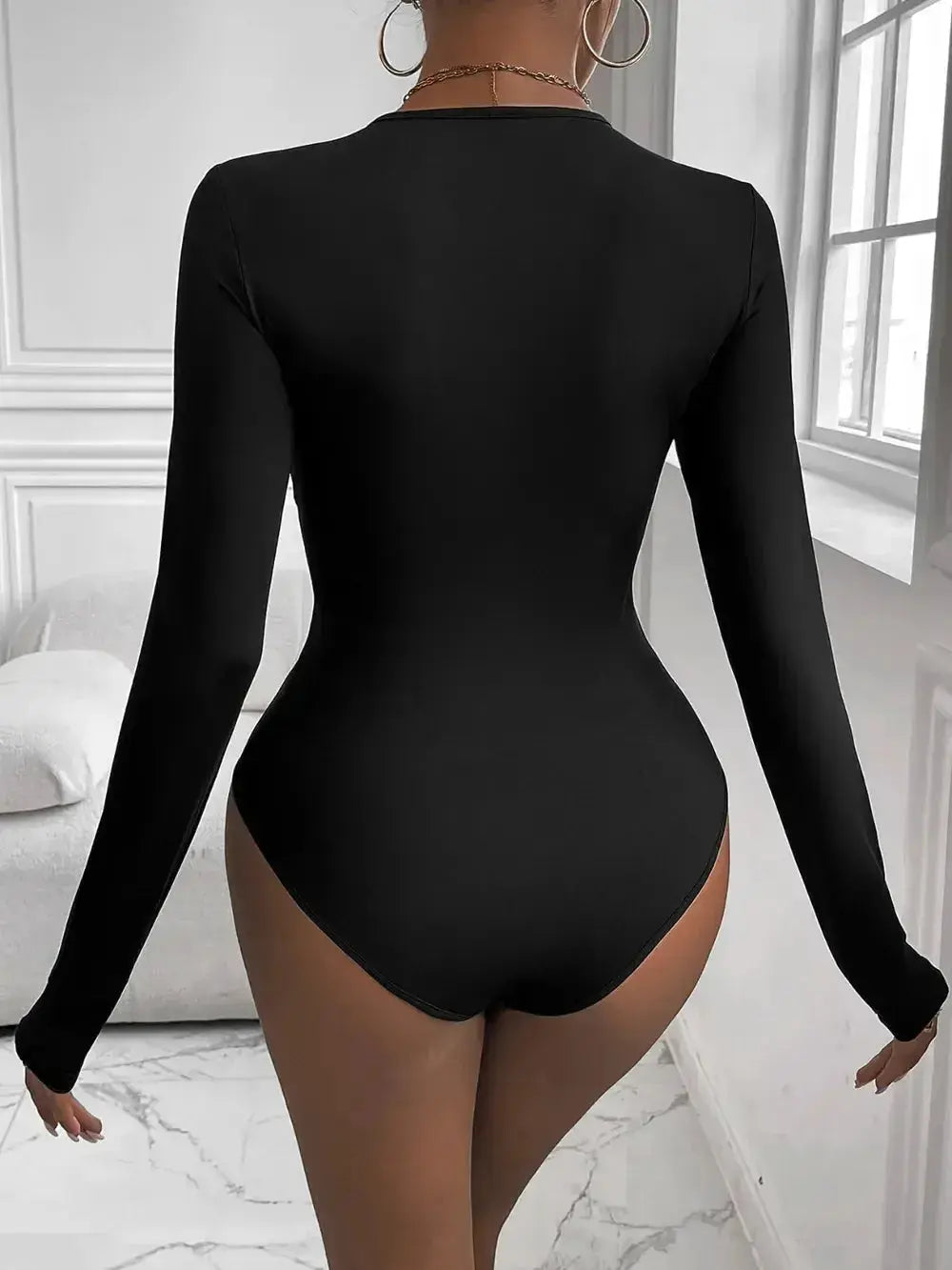 Perfee Twisted Round Neck Long Sleeve Bodysuit - DaisyDrop 