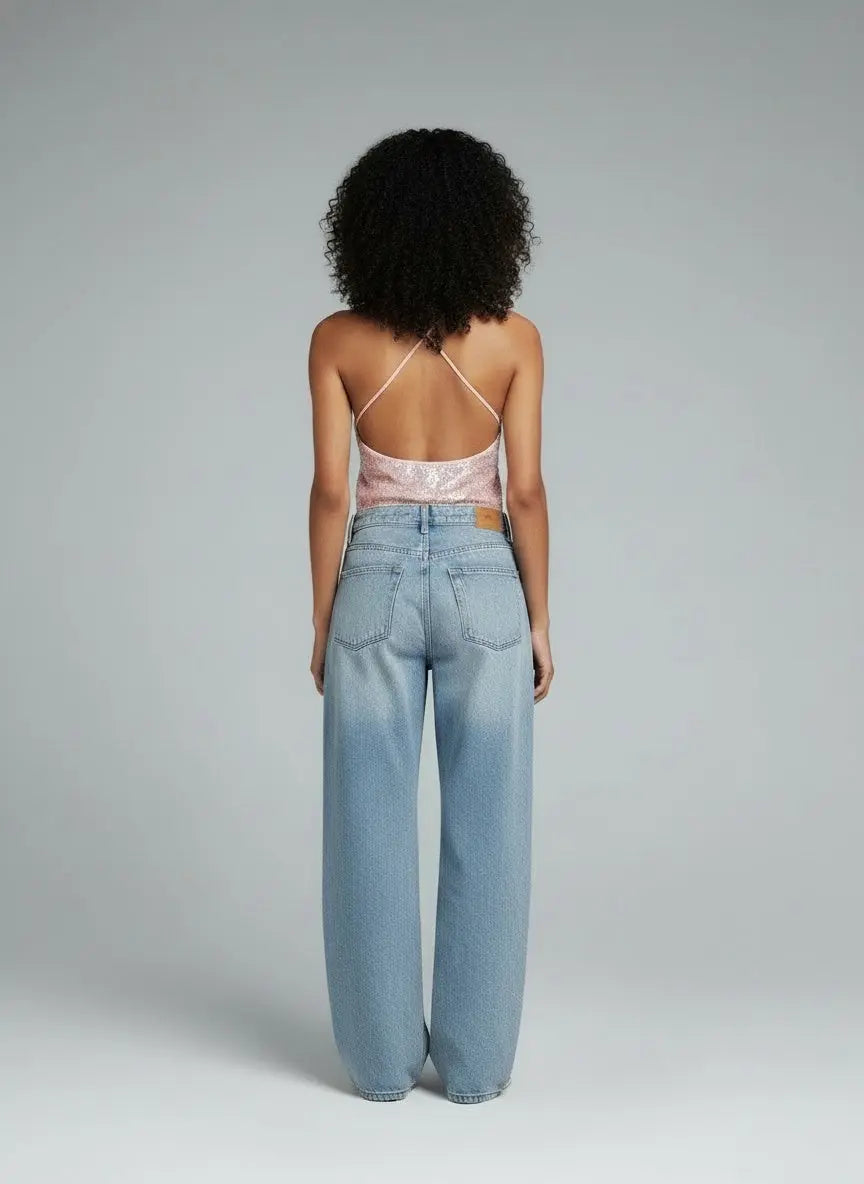 Back pose of the model wearing Sequin Halter Neck Cami
