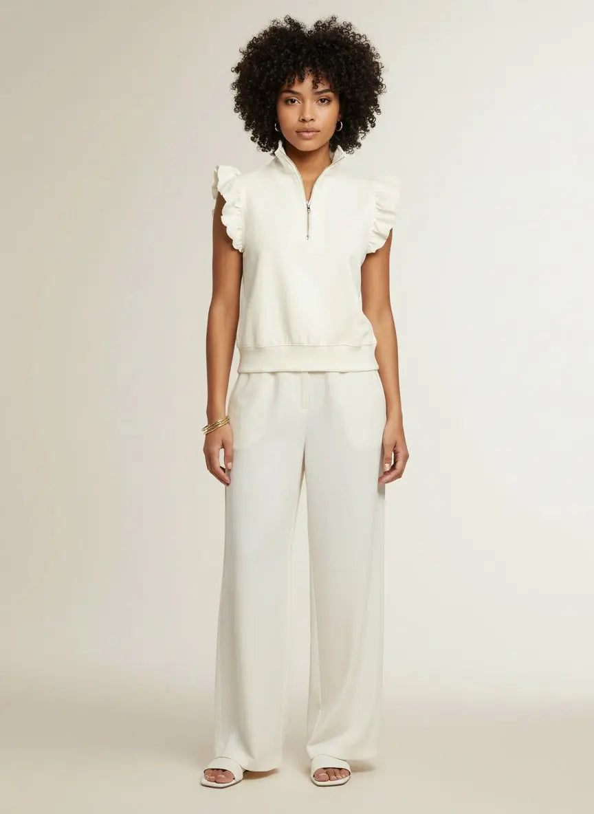 Full body view of the model wearing Zipped up Collared Ruffled Short Sleeve Blouse