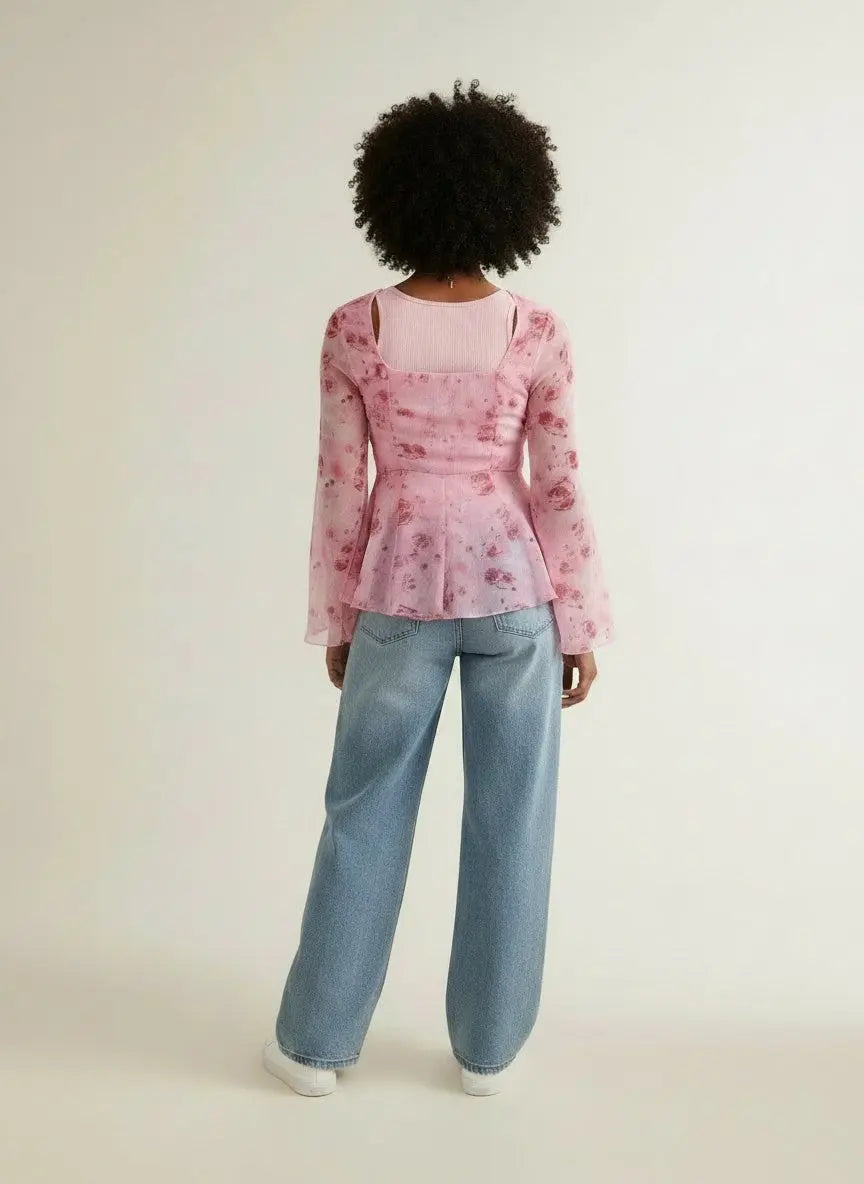 Back pose of the model wearing Floral Print Tie Front Flare Sleeve Chiffon Blouse