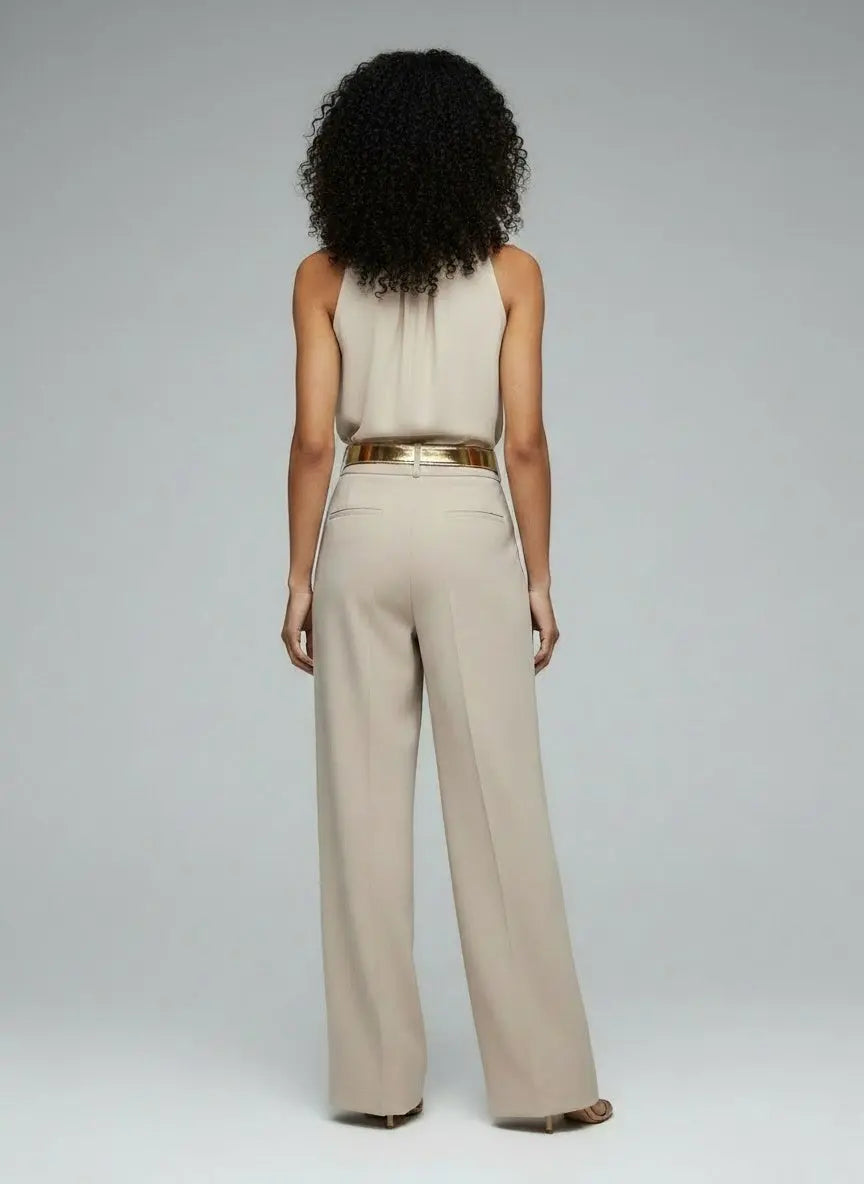 Back pose of the model wearing Ruffle High Neck Sleeveless Top